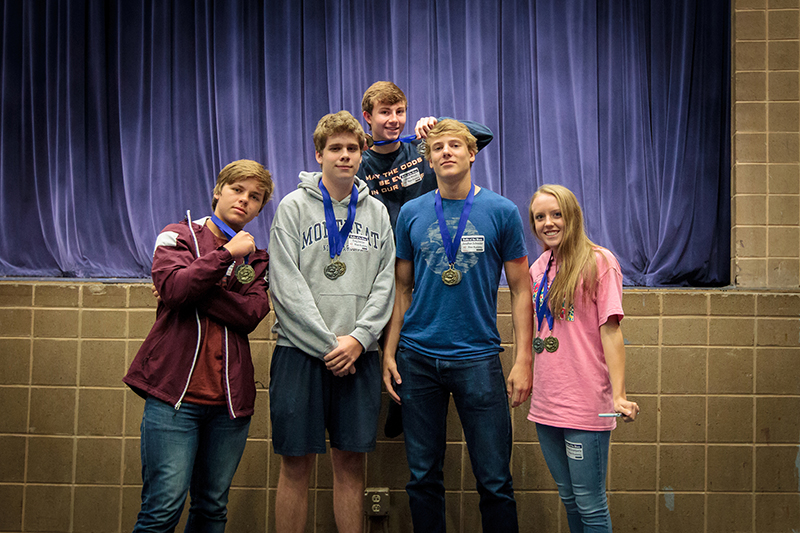 Group of students with medals