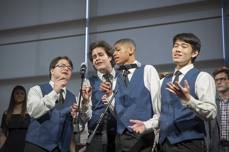 quartet of young men singing