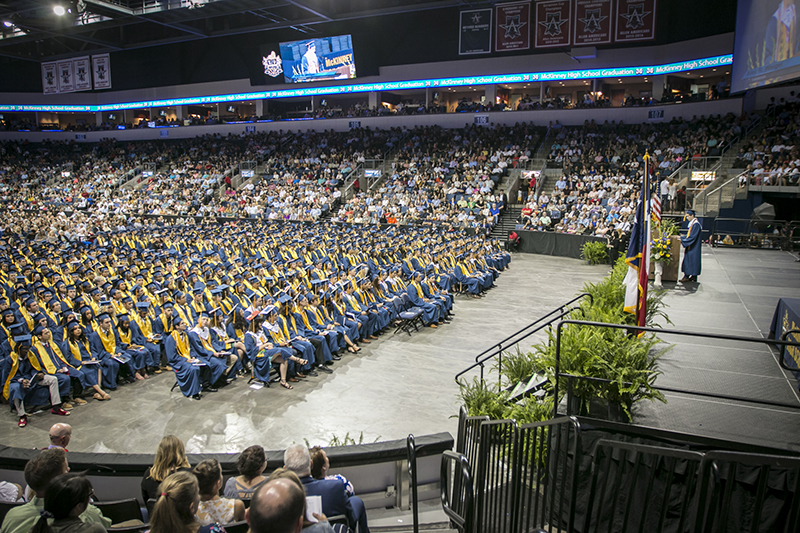 wide shot of graduates seated during ceremony