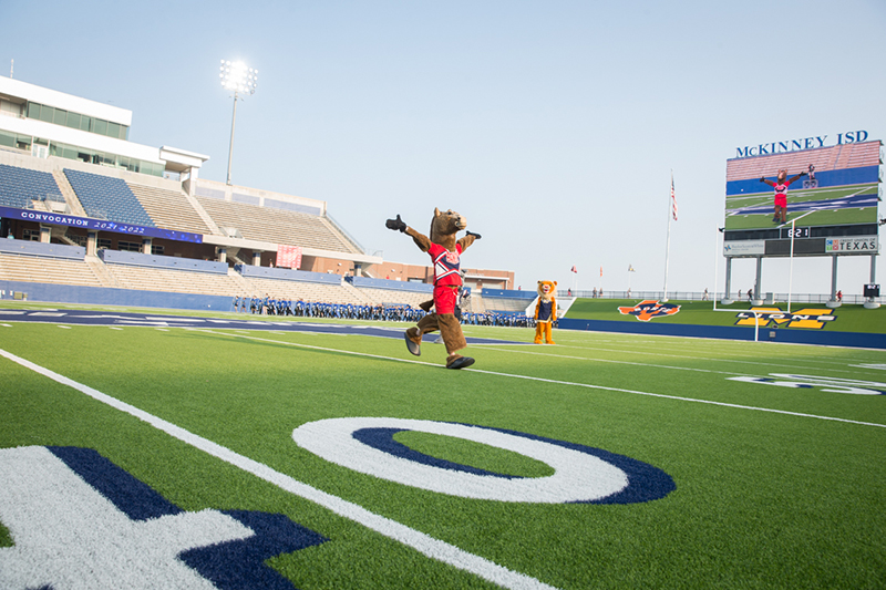Boyd mascot running across field