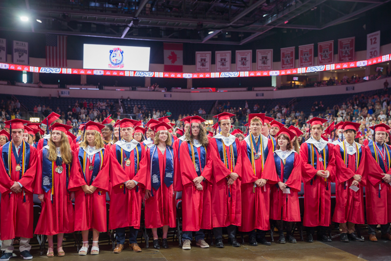 graduates in front row in a long line