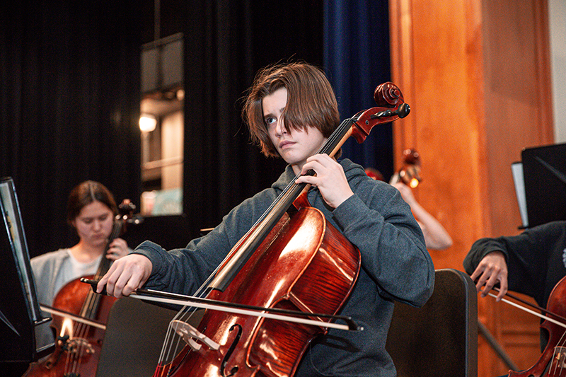 male cello player